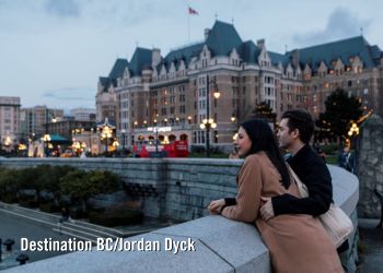 Couple in front of Parliament Buildings in Victoria